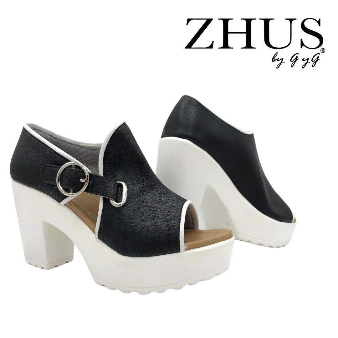 Zapatos asimétricos blanco y negro