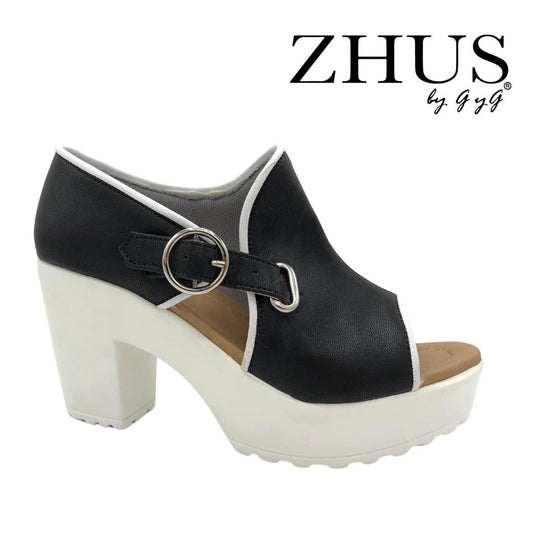 Zapatos asimétricos blanco y negro