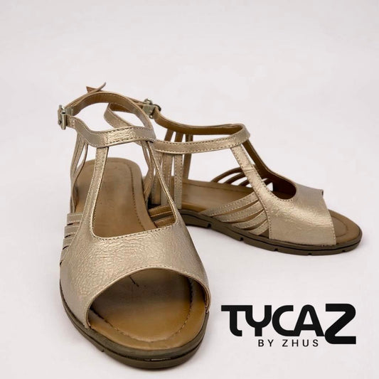 TYCAZ sandalias oro rosa