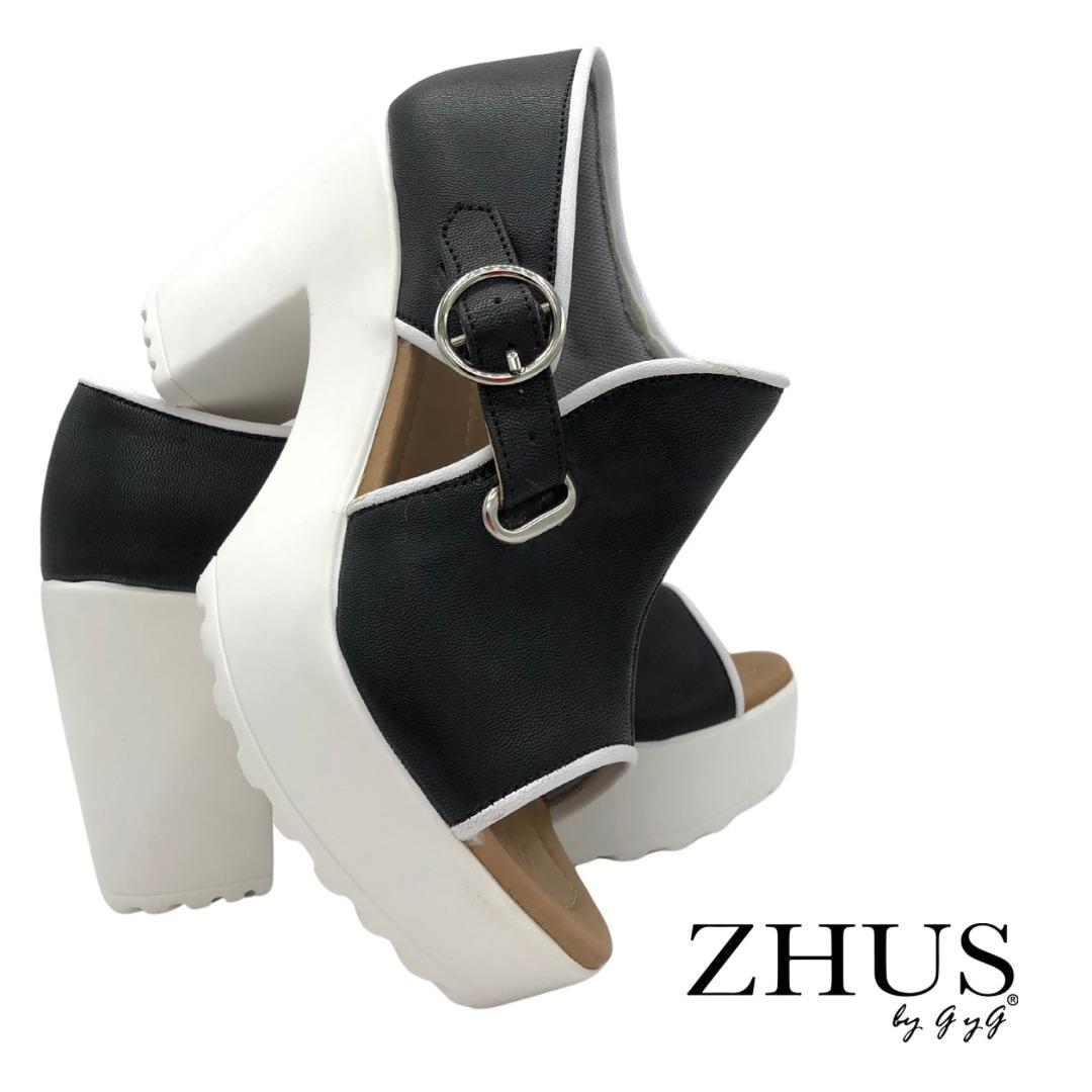 Zapatos asimétricos blanco y negro