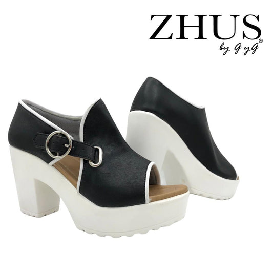 Zapatos asimétricos blanco y negro